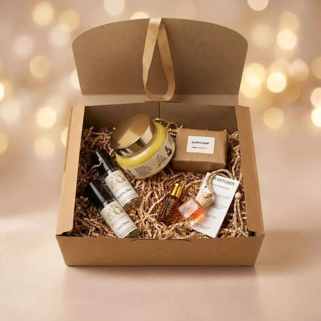 Six-item Bath & Fragrance Gift Set against a celebratory champagne-gold and blush background with warm golden lights